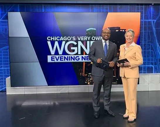 Tahman Bradley and his co-anchor, Jackie Bange, at the WGN-TV news set.