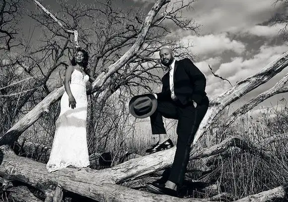 Tahman Bradley and his wife, Jennifer Bradley, posing for their wedding photoshoot. (