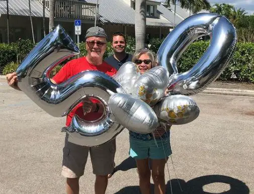 Brian Monahan, in Florida,Â with his mom and dad celebrating their 50th wedding anniversary