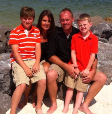 Brain Britt with his wife, Christy, and his two sons while they were kids