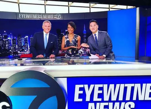 CeFaan Kim on the set of Eyewitness News with the journalists, Bill Ritter and Sade Baderinwa
