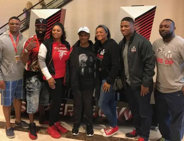 Warrick Dunn posing with his siblings and grandmother