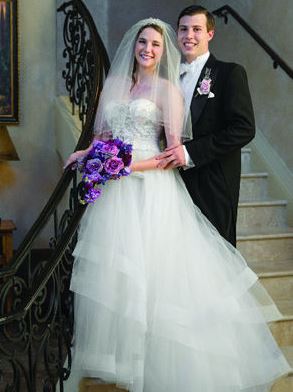 Frank FigliuzziÃ¢â‚¬â„¢s son Andrew posing and his wife Rachel during their wedding ceremony at Woodlands Church Chapel in Texas. 