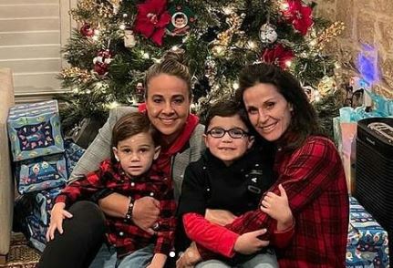 Becky Hammon with her two sons and wife, Brenda.
