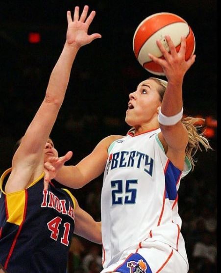 Becky Hammon shooting a lay-up in a game while at New York Liberty.