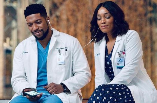 Jocko Sims with co-actress Frances Turner from a scene of New Amsterdam 