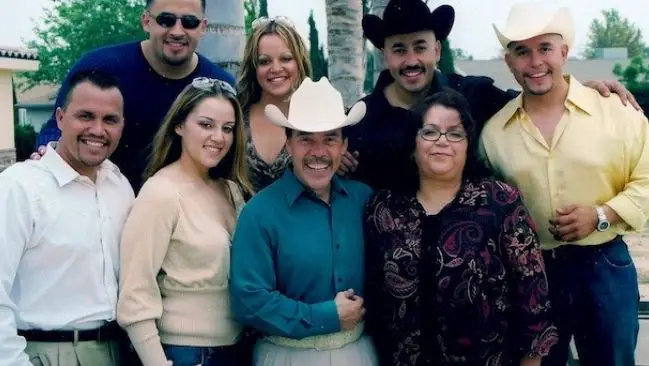 Pedro Rivera posing with his former wife, Rosa Saavedra, and his children