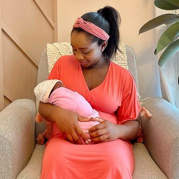 Marcus Richardson's wife, Abby Phillip, holding her newborn daughter 