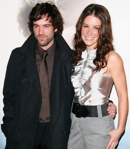 Murray Hone posing with his former wife, Evangeline Lily 