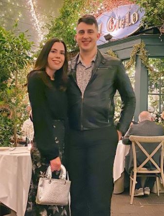 Jen with her new partner, Andy, at an Italian restaurant.