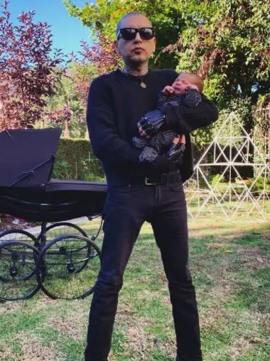 Kat Von D's Instagram post of her husband, Rafael Reyes, holding their son.