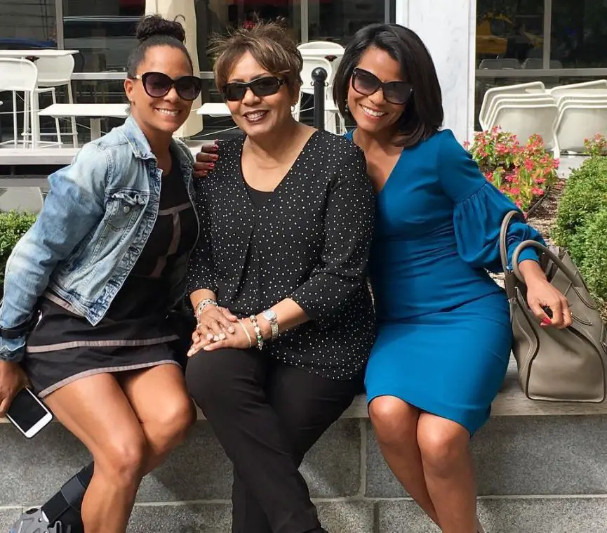 Rhonda Walker posing with her mother and sister on a casual day-out in 2018. 