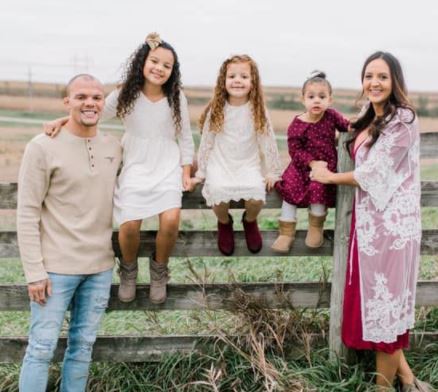 Anthony Smith with his wife, Mikhala Smith Newman, and daughters, Ariah, Avaya, and Adley 