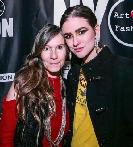 Victoria Henley, with her mother Lynn Henley, attaining a fashion event. 