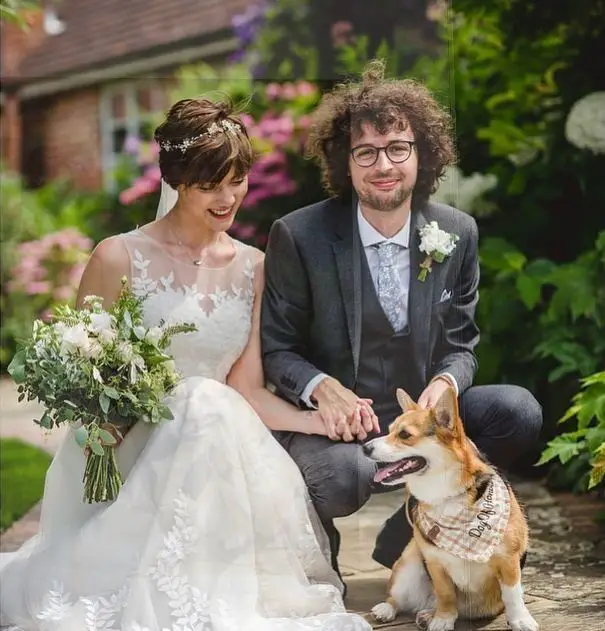 Joseph-Garrett-with-his-wife-and-his-pet-dog-on-their-wedding-day-2019