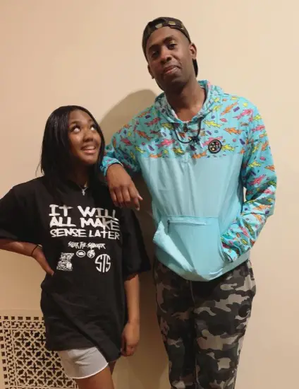 Silkk and his daughter in a frame