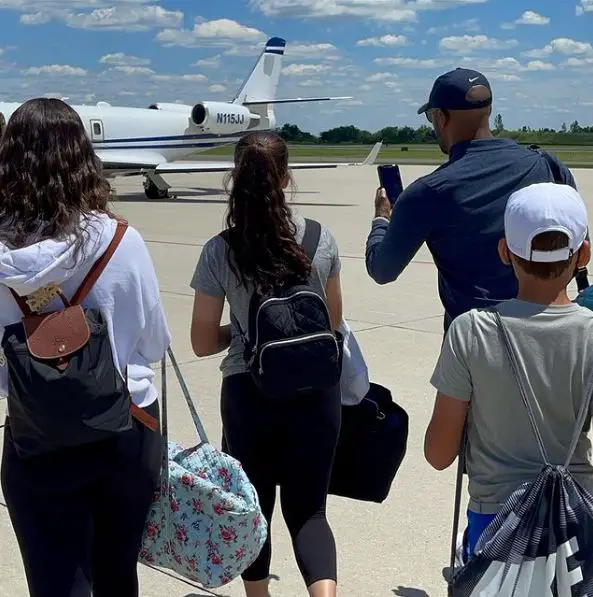 Louis Riddick headed to catch a flight with his son and daughters